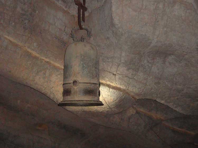 ancient bronze bell in bich dong pagoda