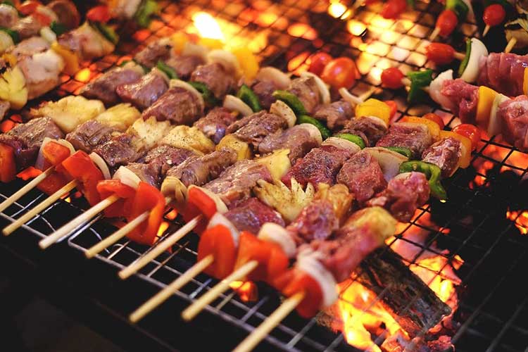 Grilled meat and seafood skewers